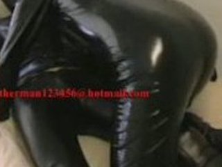 Full rubber mistress gets worshiped