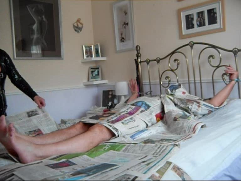 Newspaper fetish with full