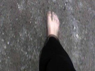 Barefoot girl walking