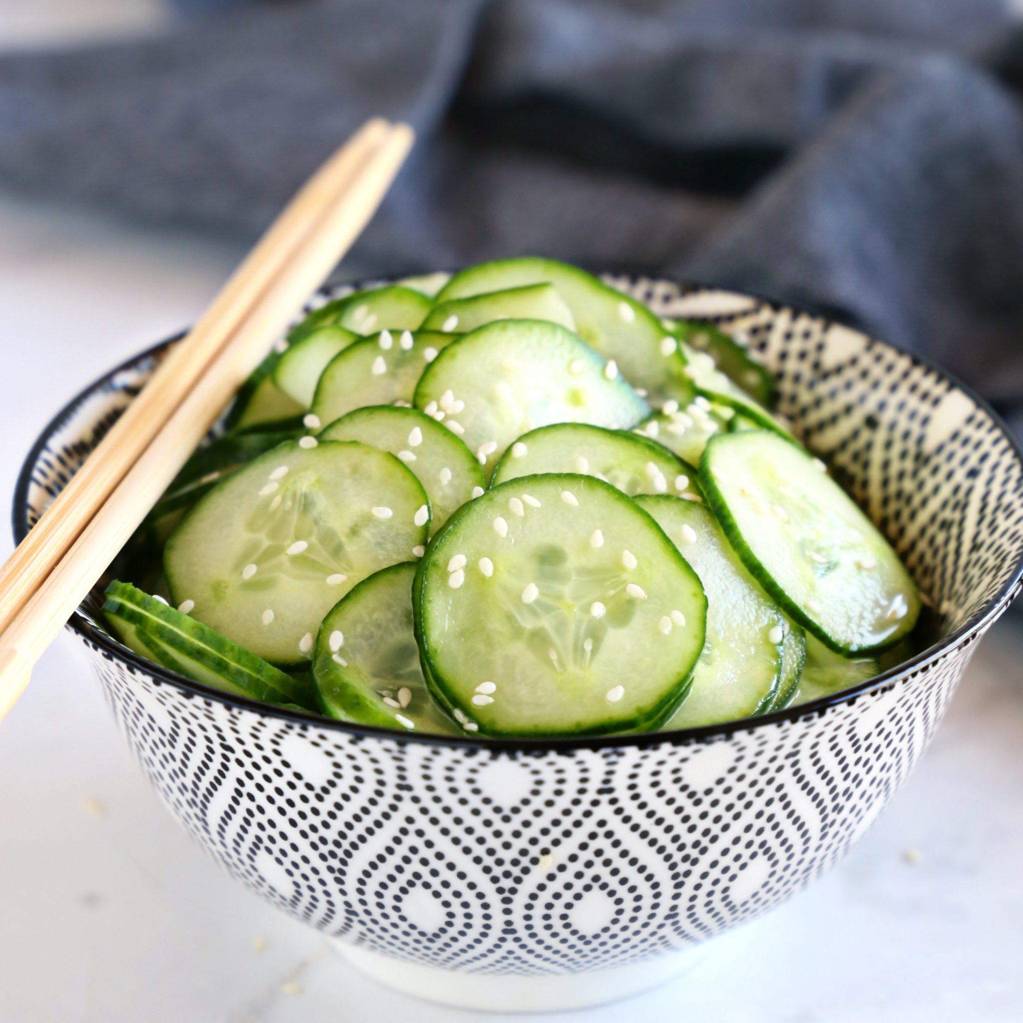 Asian wife with cucumber photo