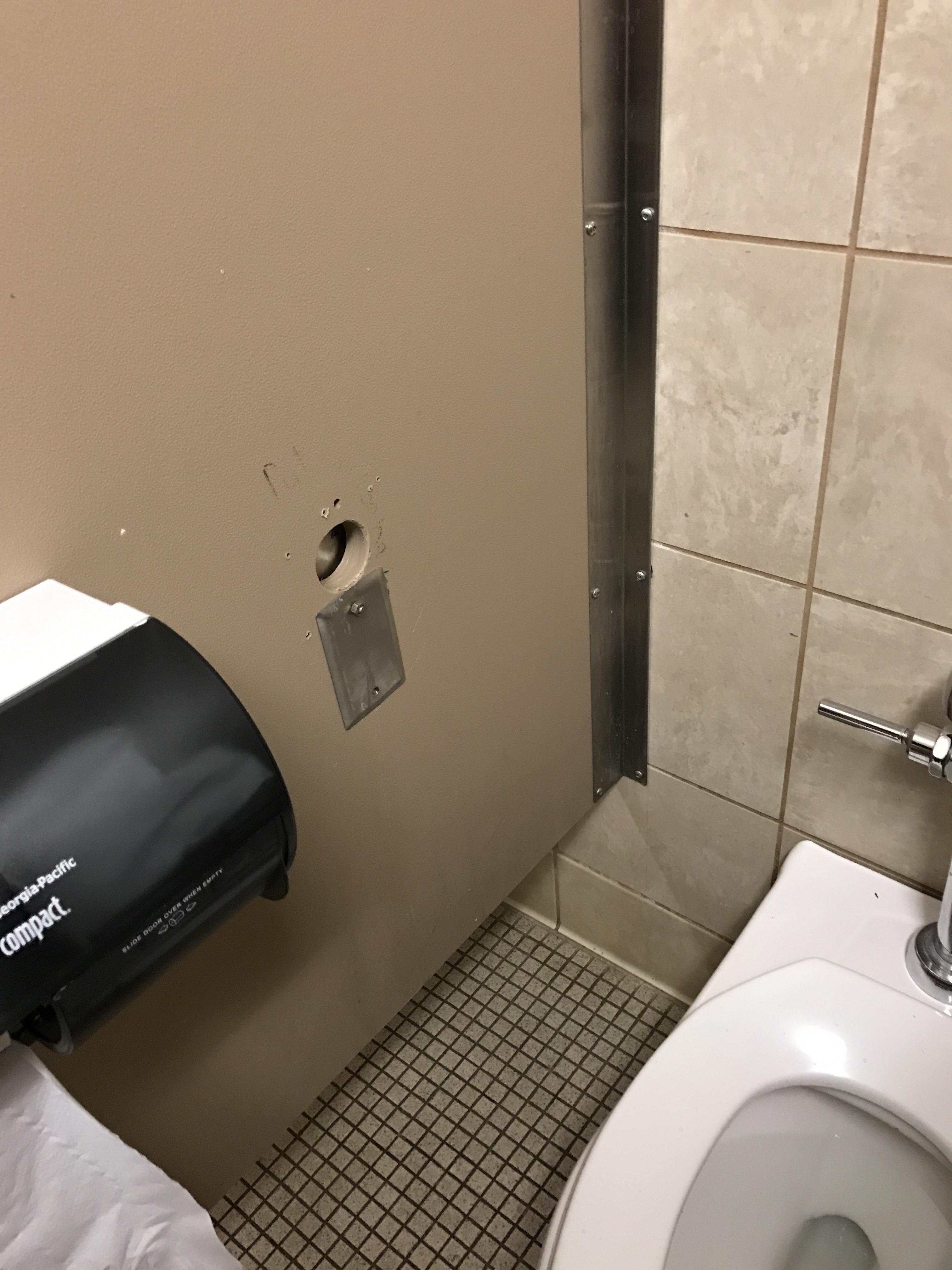 Toilet sex hole in wall