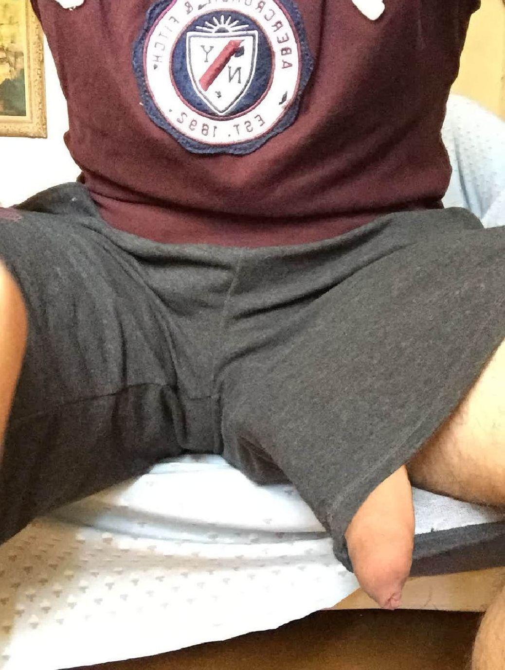 Cock sticking out of shorts  pic